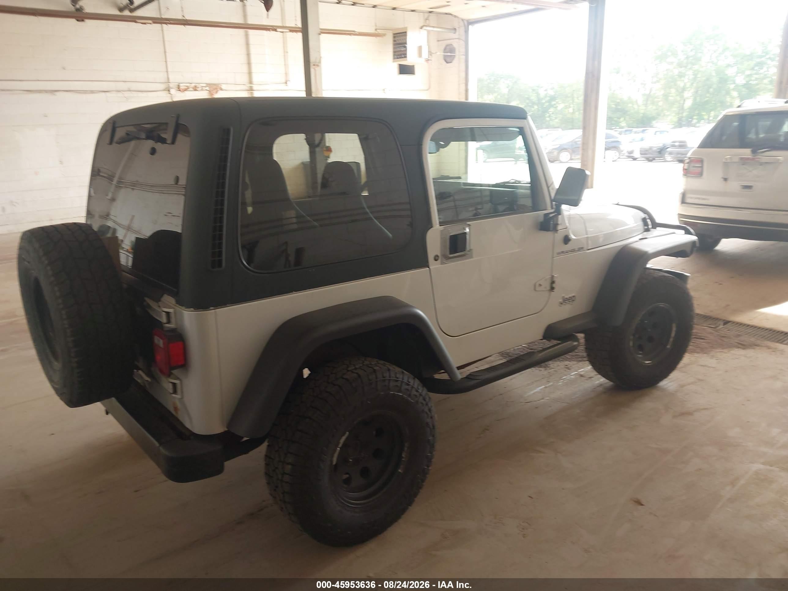 2002 Jeep Wrangler X Серебряный vin: 1J4FA39S02P751049