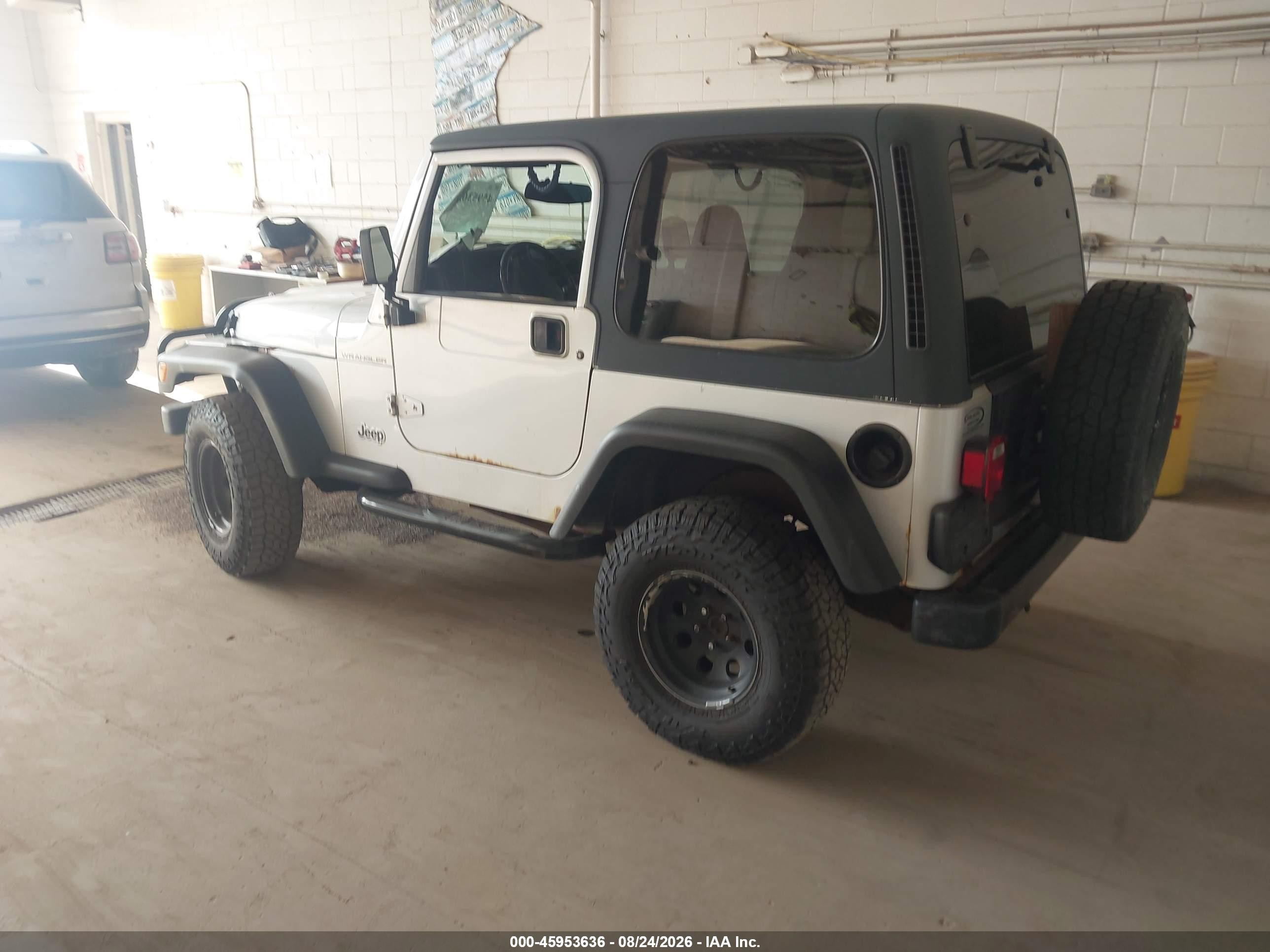 2002 Jeep Wrangler X Серебряный vin: 1J4FA39S02P751049