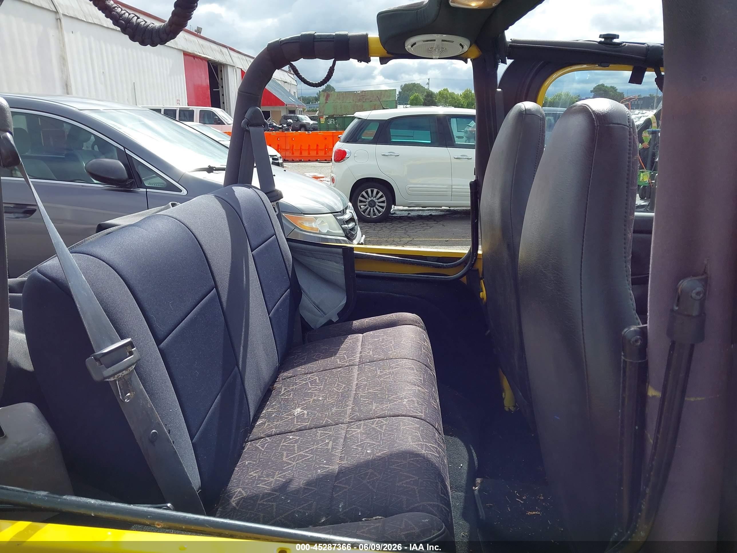 2002 Jeep Wrangler X Yellow vin: 1J4FA39S02P759457