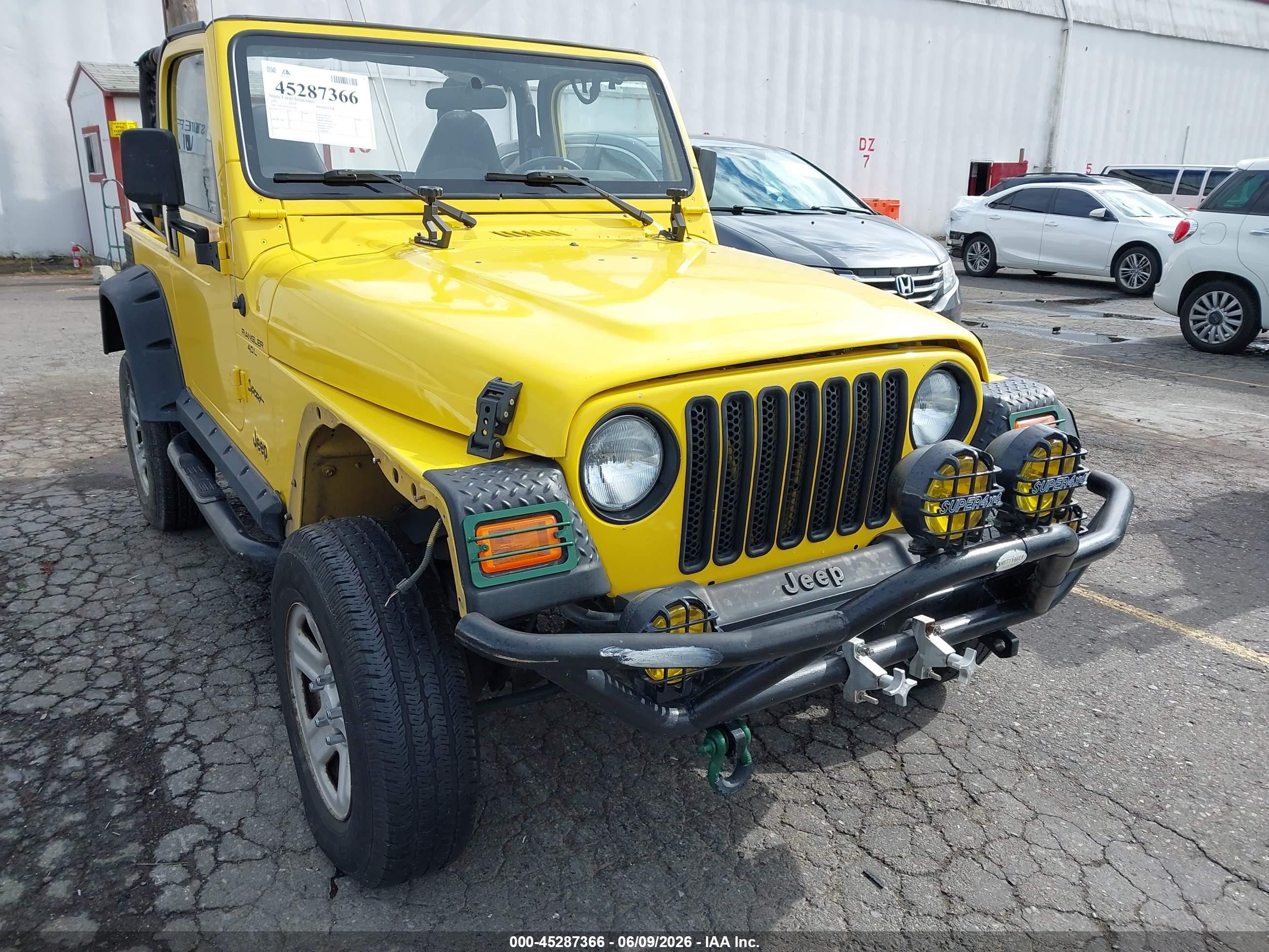 2002 Jeep Wrangler X Yellow vin: 1J4FA39S02P759457