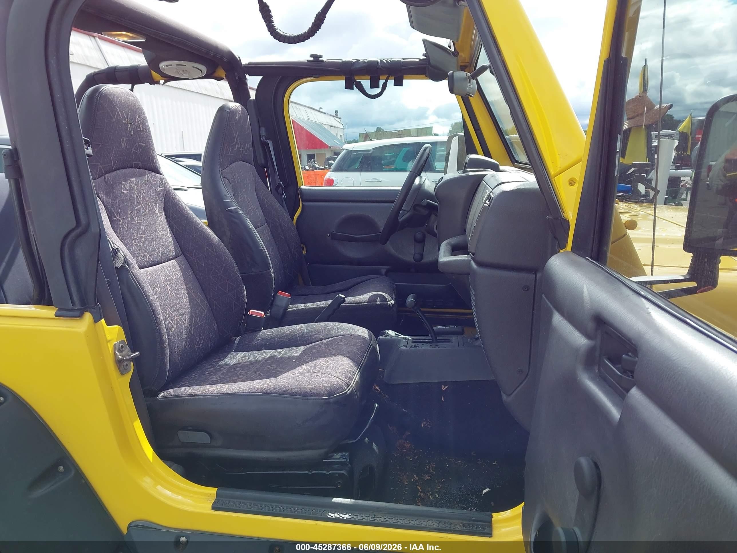2002 Jeep Wrangler X Yellow vin: 1J4FA39S02P759457