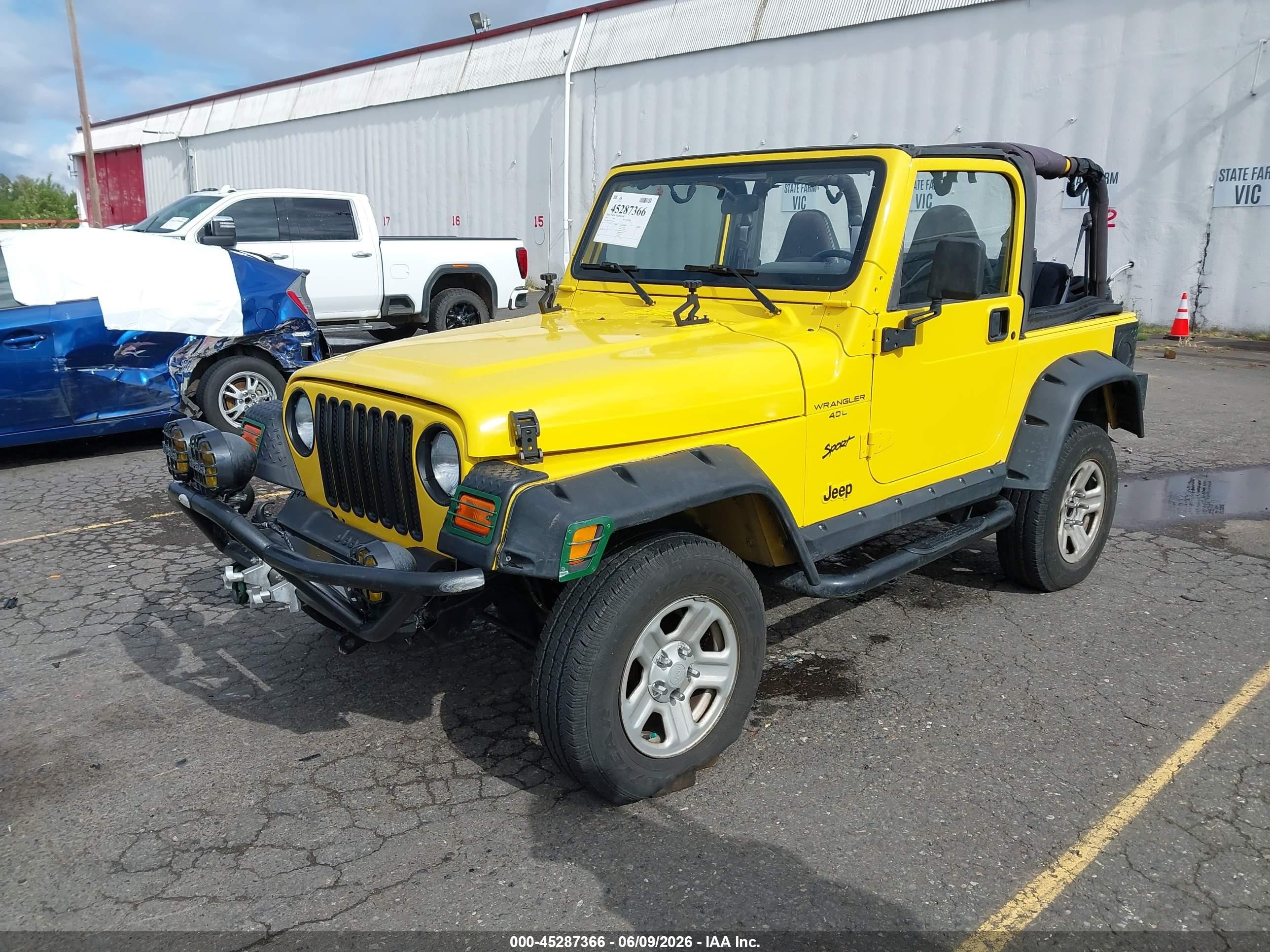 2002 Jeep Wrangler X Yellow vin: 1J4FA39S02P759457