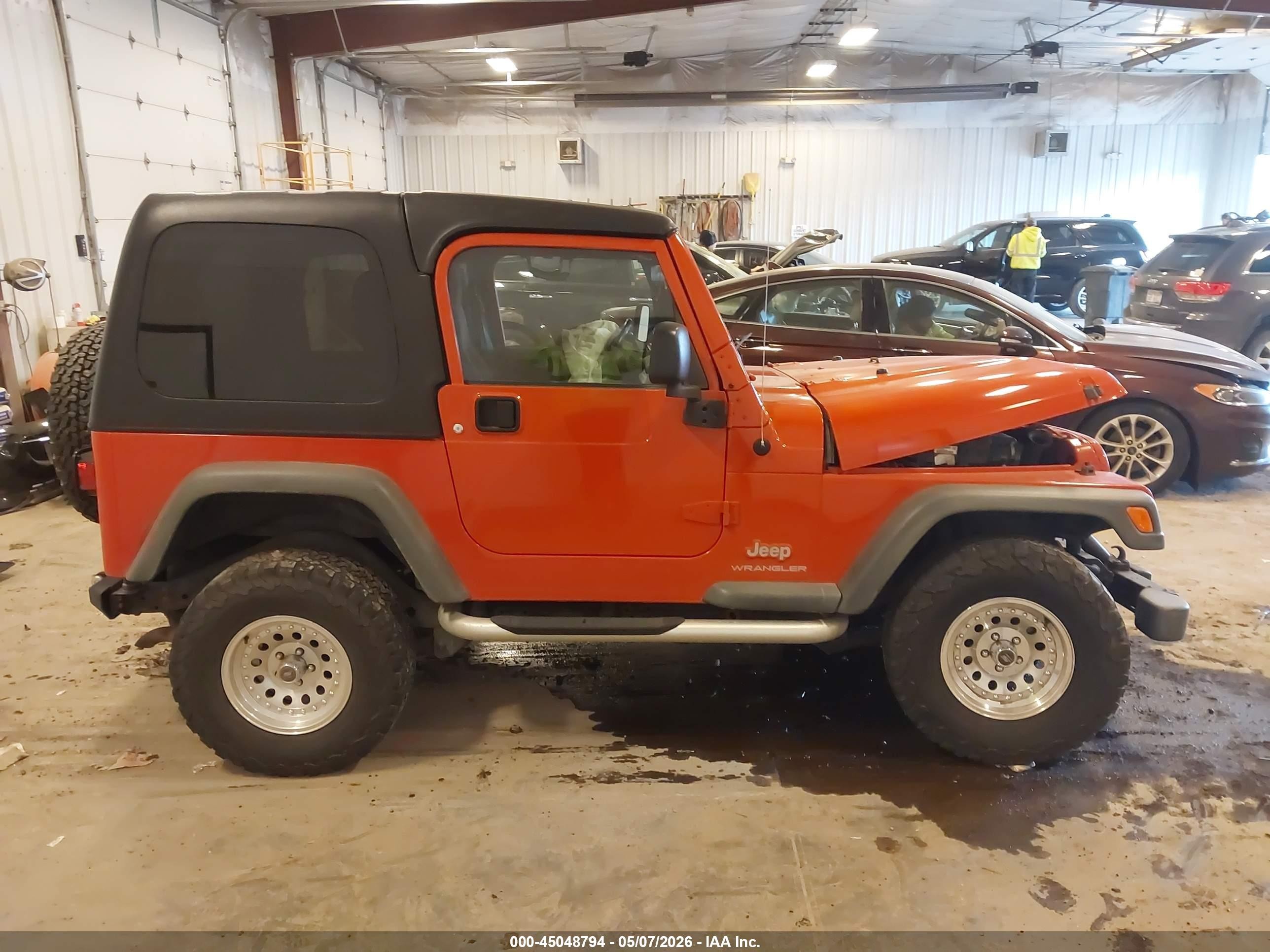 2005 Jeep Wrangler X Orange vin: 1J4FA39S15P387843