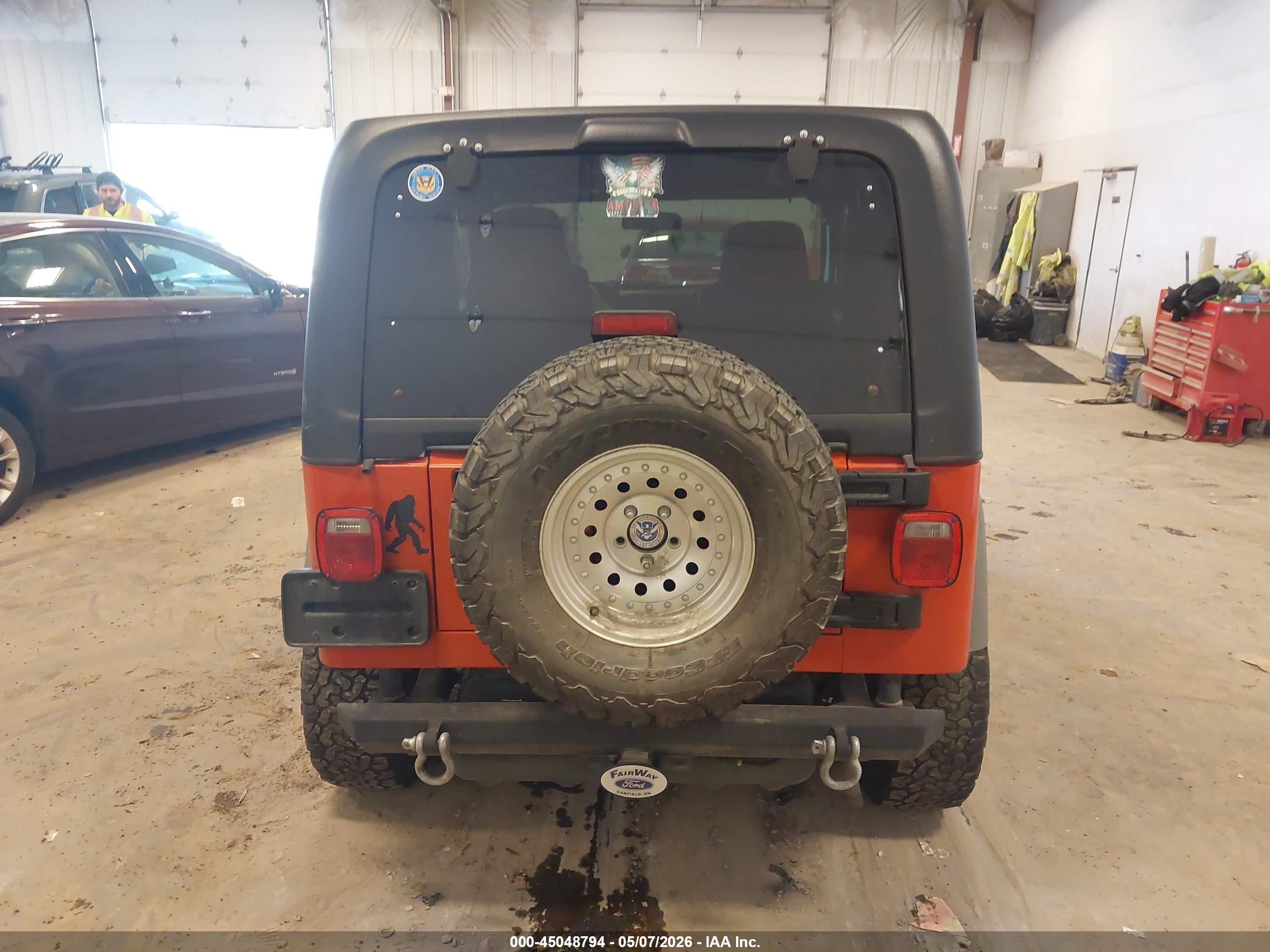 2005 Jeep Wrangler X Orange vin: 1J4FA39S15P387843
