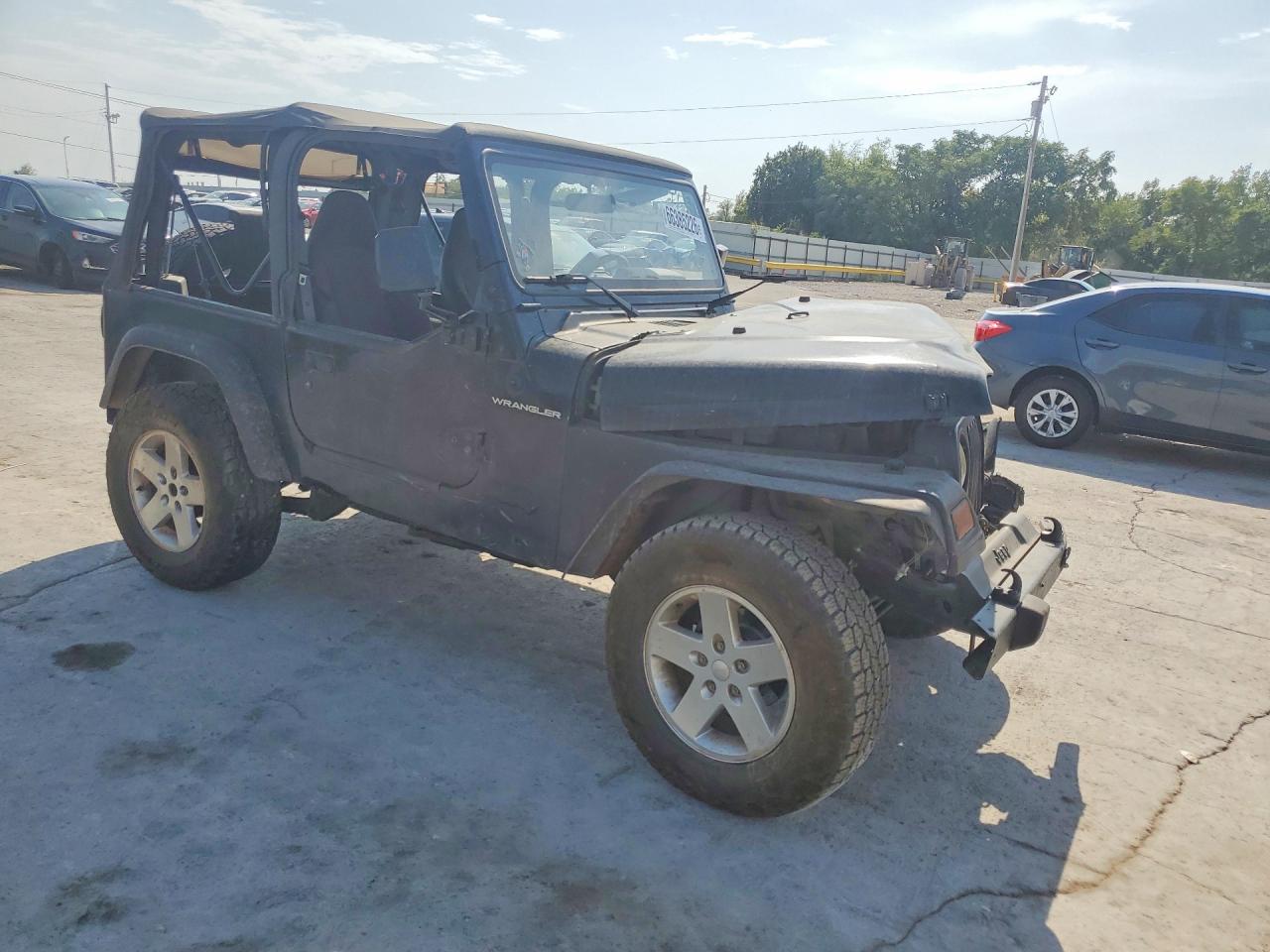 2002 Jeep Wrangler / Tj X Black vin: 1J4FA39S22P770394