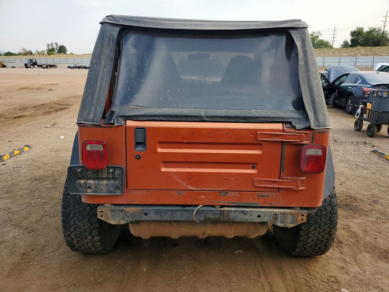 2002 Jeep Wrangler / Tj X Orange vin: 1J4FA39S62P750472