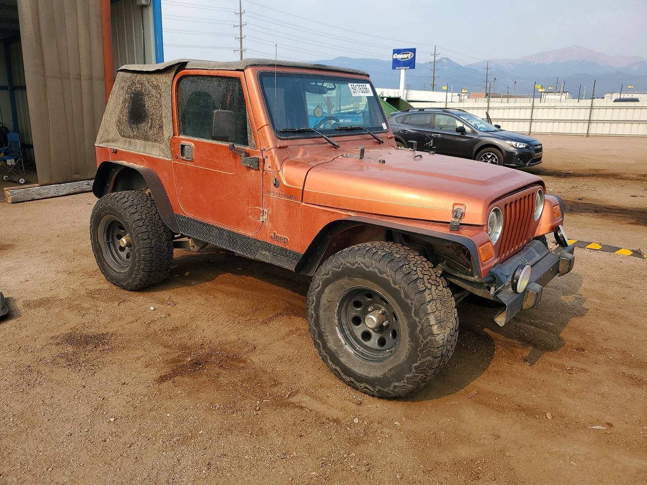 2002 Jeep Wrangler / Tj X Orange vin: 1J4FA39S62P750472
