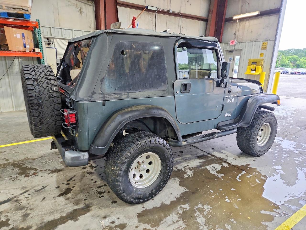 2002 Jeep Wrangler / Tj X Teal vin: 1J4FA39S72P708845