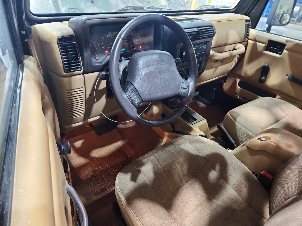 2002 Jeep Wrangler / Tj X Teal vin: 1J4FA39S72P708845