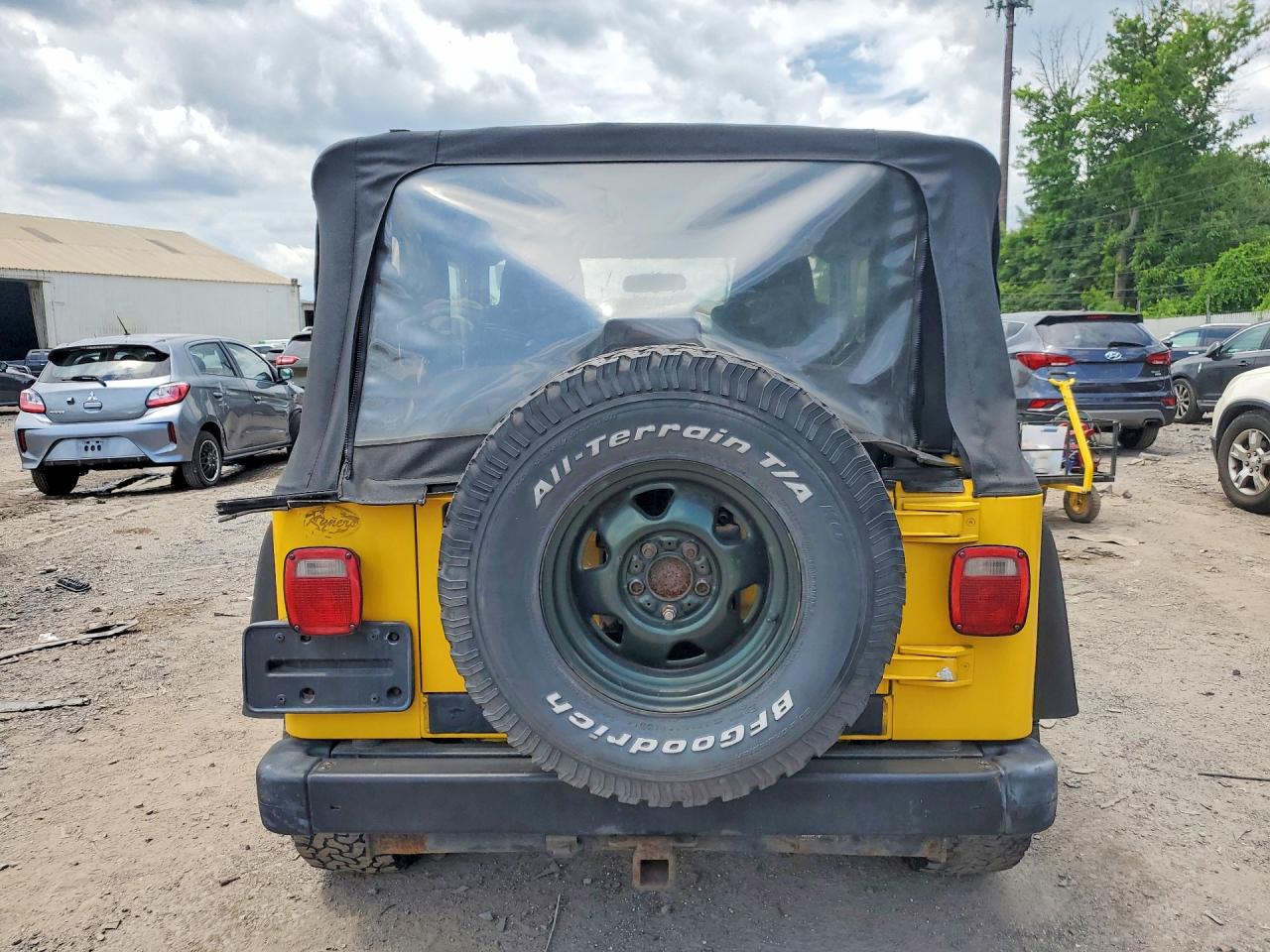 2004 Jeep Wrangler X Yellow vin: 1J4FA39S94P708574