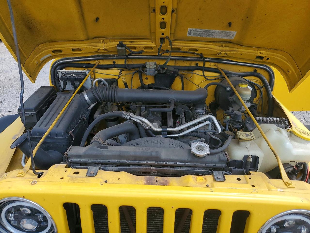 2004 Jeep Wrangler X Yellow vin: 1J4FA39S94P708574