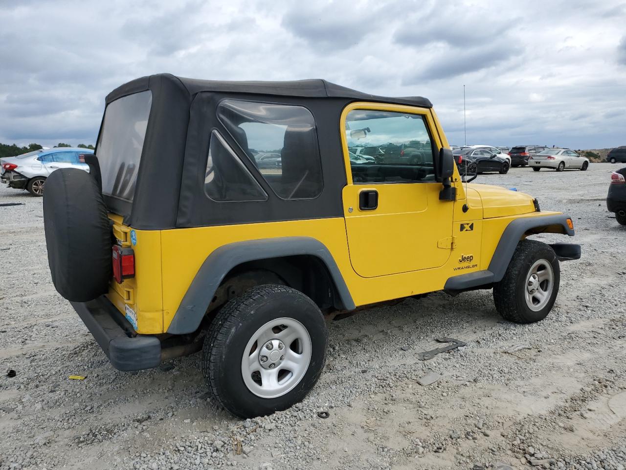 2004 Jeep Wrangler X Yellow vin: 1J4FA39SX4P746458