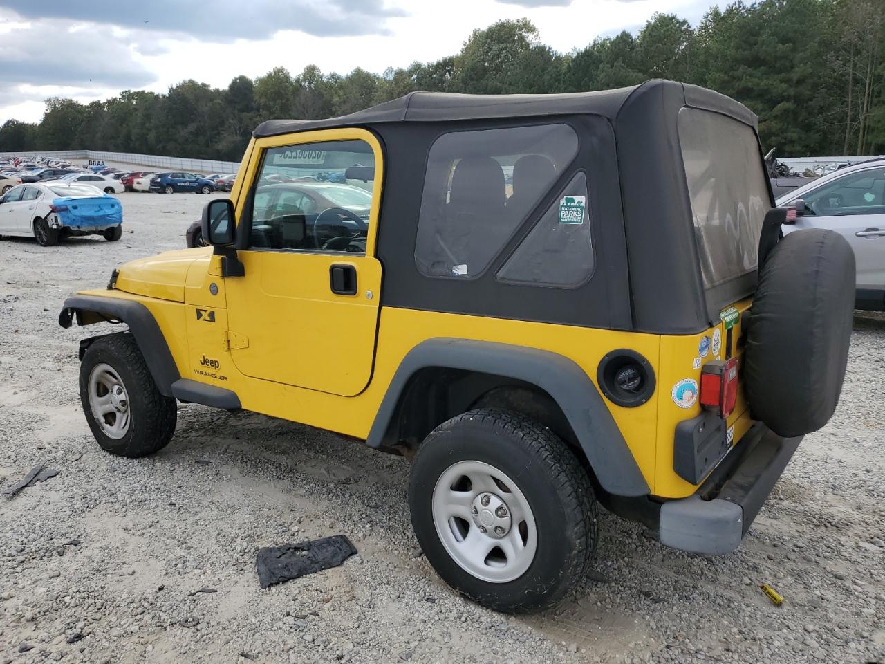 2004 Jeep Wrangler X Yellow vin: 1J4FA39SX4P746458