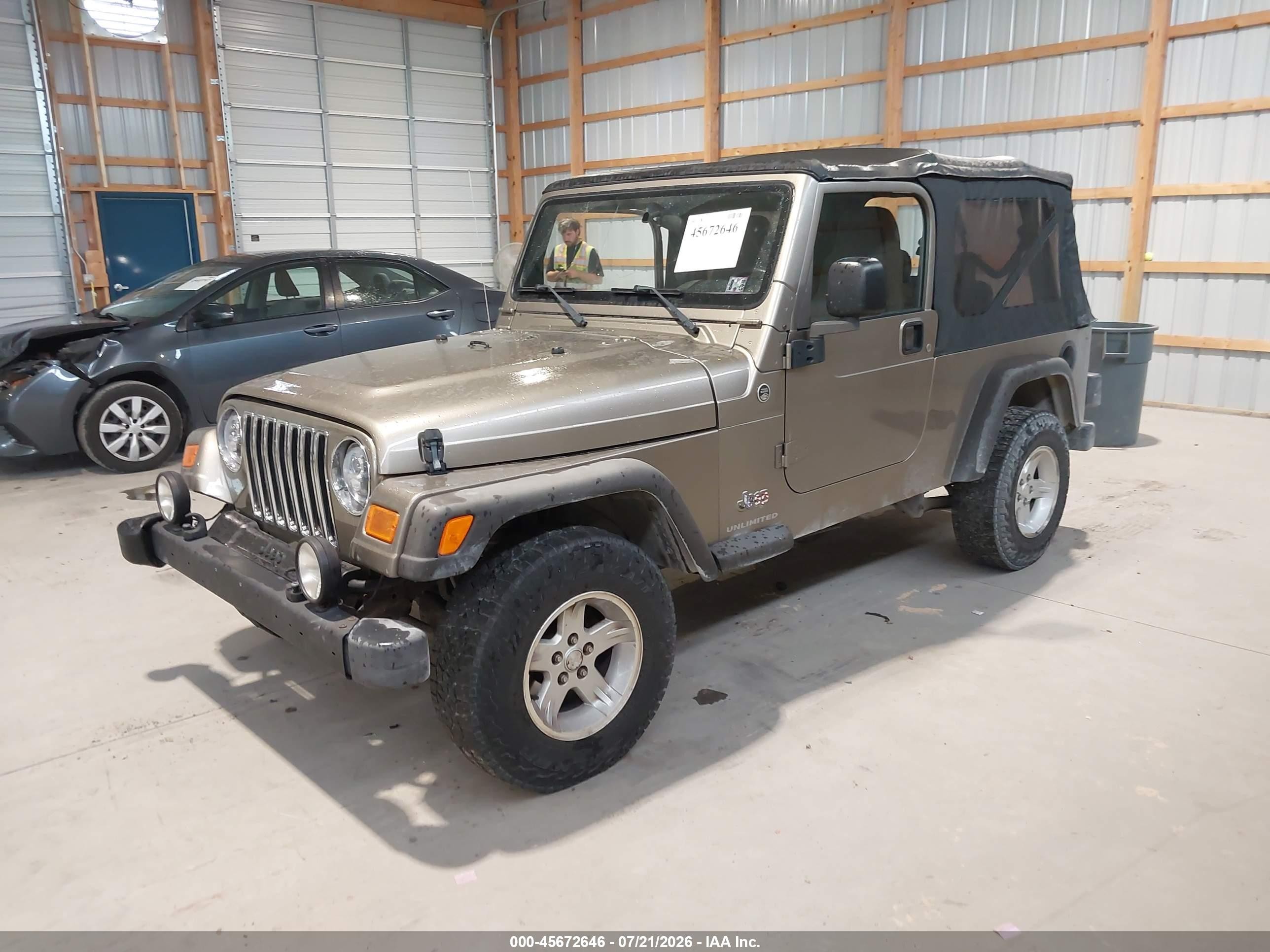 2005 Jeep Wrangler Unlimited Tan vin: 1J4FA44S05P320034