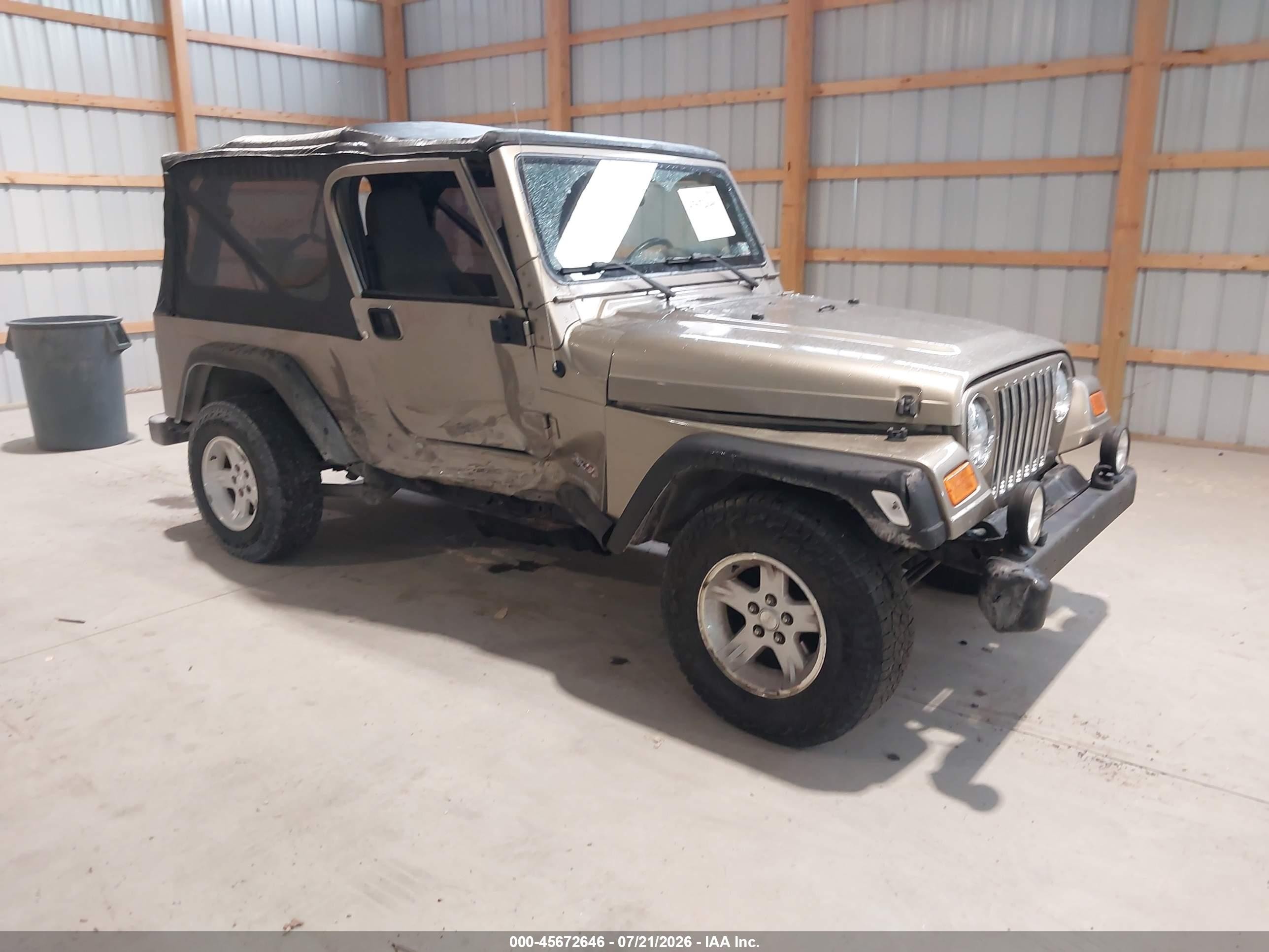 2005 Jeep Wrangler Unlimited Tan vin: 1J4FA44S05P320034