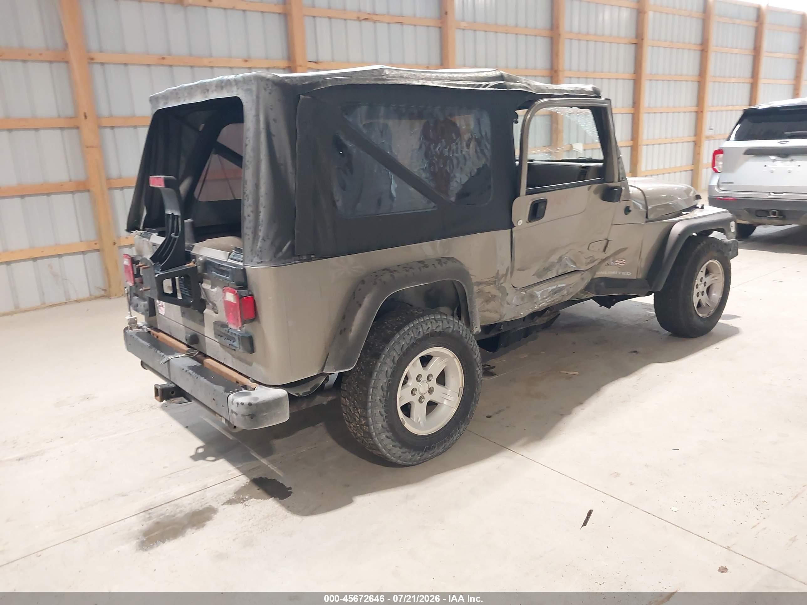 2005 Jeep Wrangler Unlimited Tan vin: 1J4FA44S05P320034