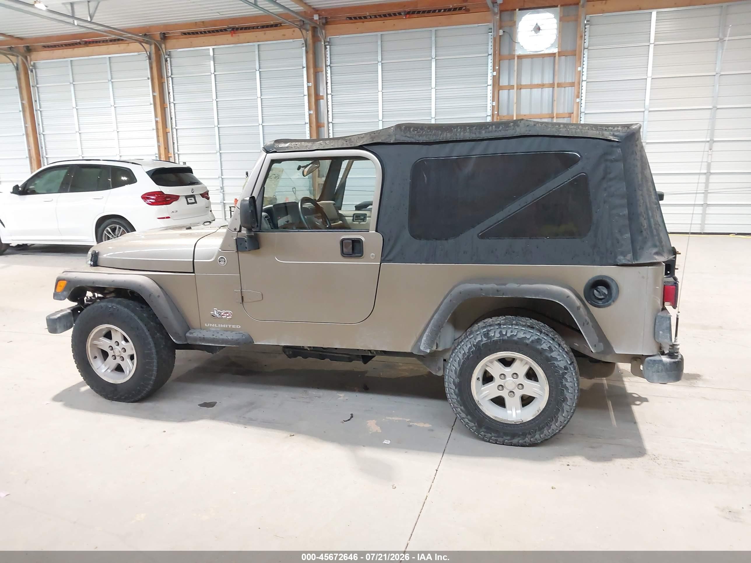 2005 Jeep Wrangler Unlimited Tan vin: 1J4FA44S05P320034