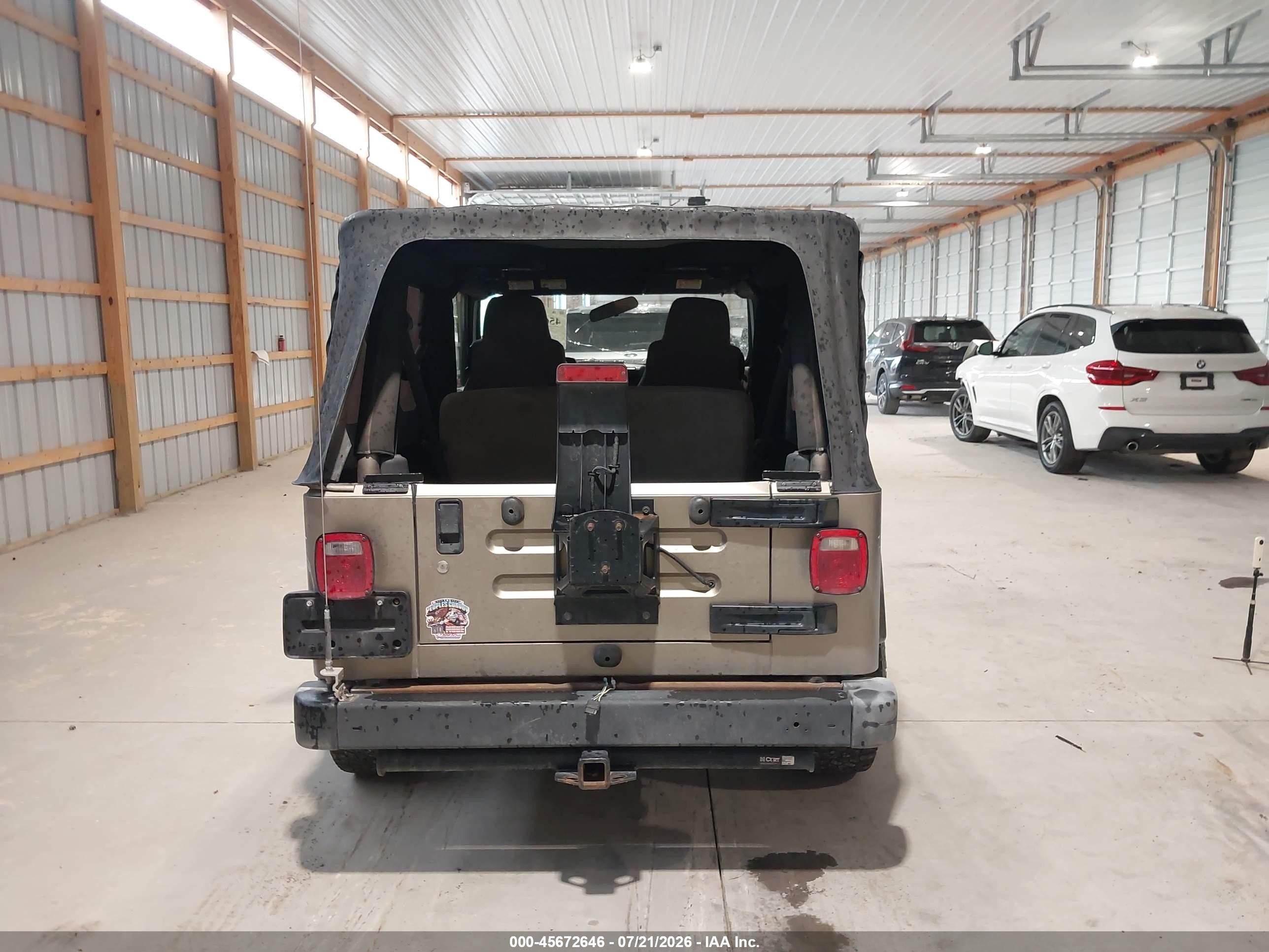 2005 Jeep Wrangler Unlimited Tan vin: 1J4FA44S05P320034