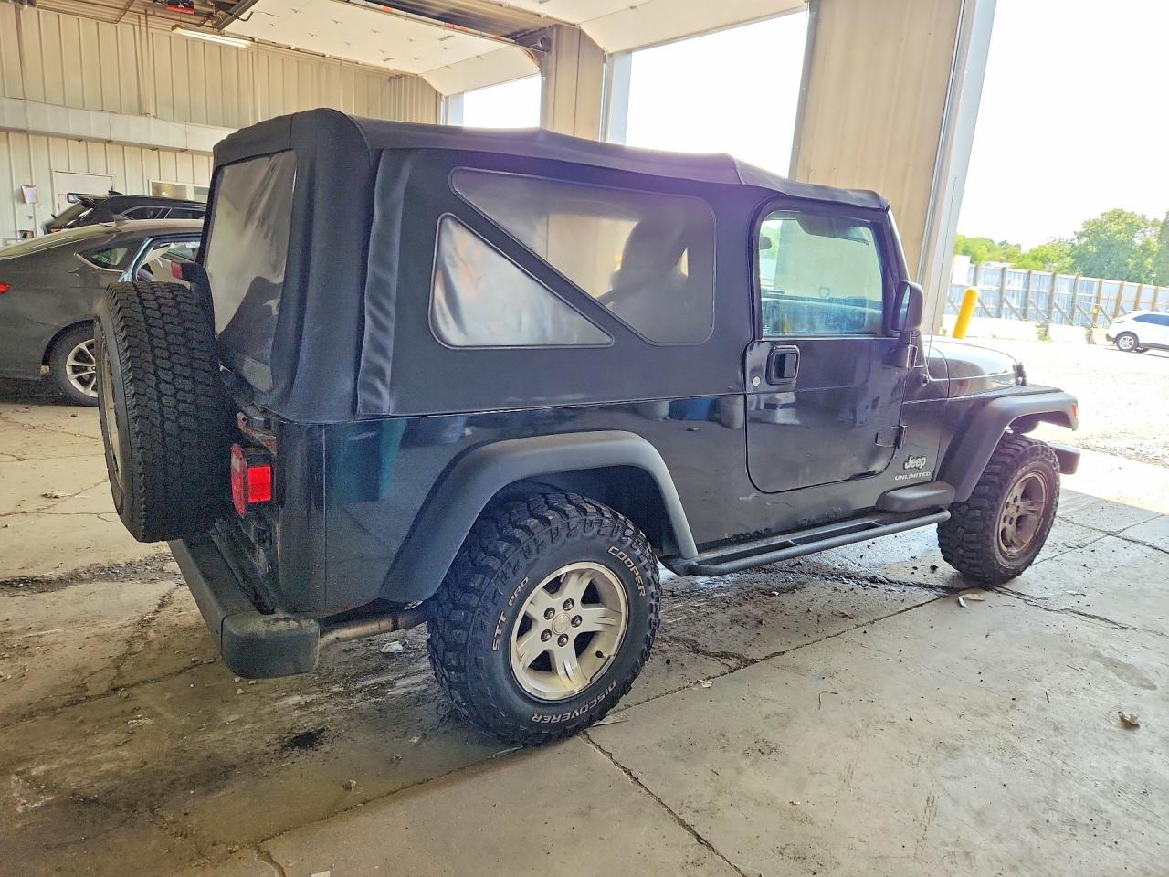 2006 Jeep Wrangler / Tj Unlimited Черный vin: 1J4FA44S76P735112