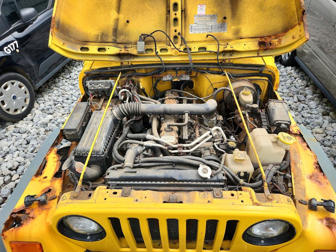 2000 Jeep Wrangler / Tj Sport Yellow vin: 1J4FA49S0YP716008