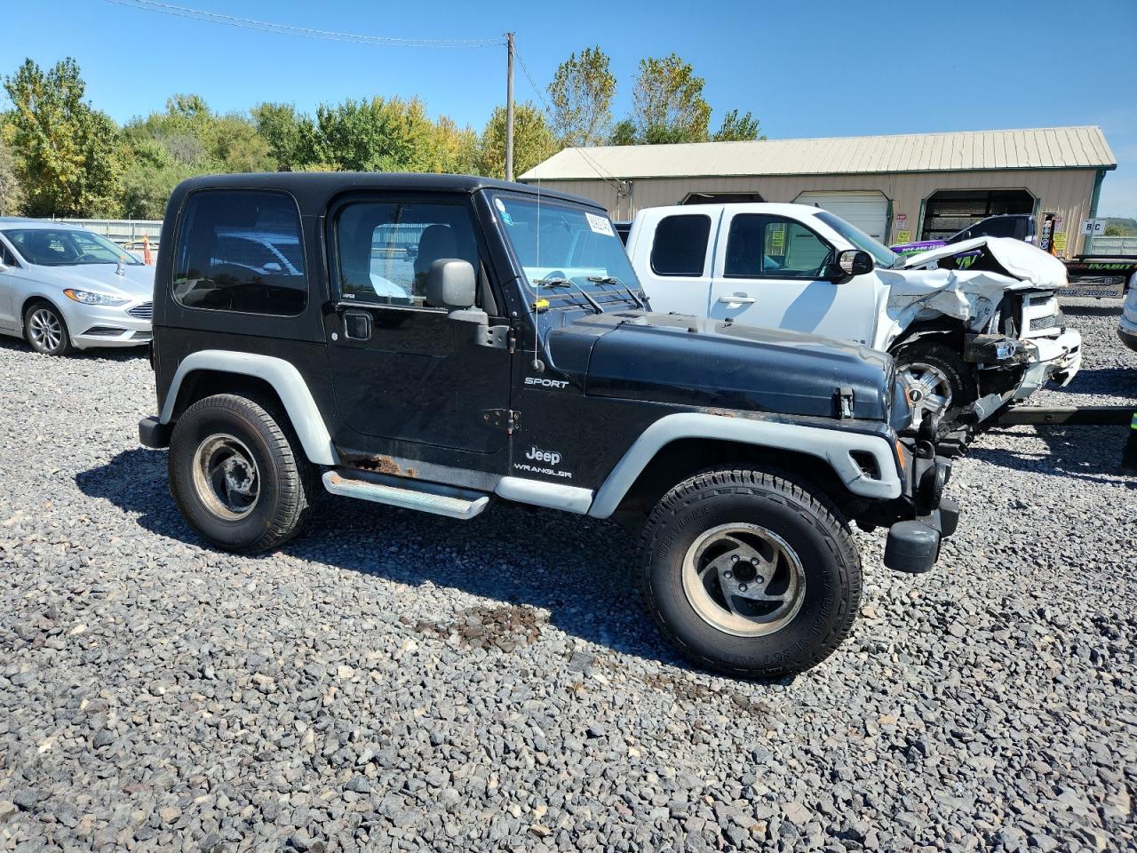 2004 Jeep Wrangler / Tj Sport Black vin: 1J4FA49S14P757130