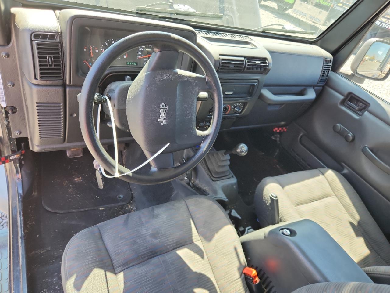 2004 Jeep Wrangler / Tj Sport Black vin: 1J4FA49S14P757130