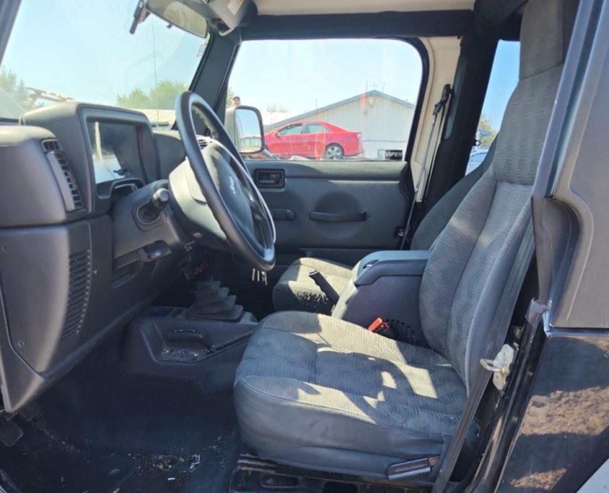 2004 Jeep Wrangler / Tj Sport Black vin: 1J4FA49S14P757130
