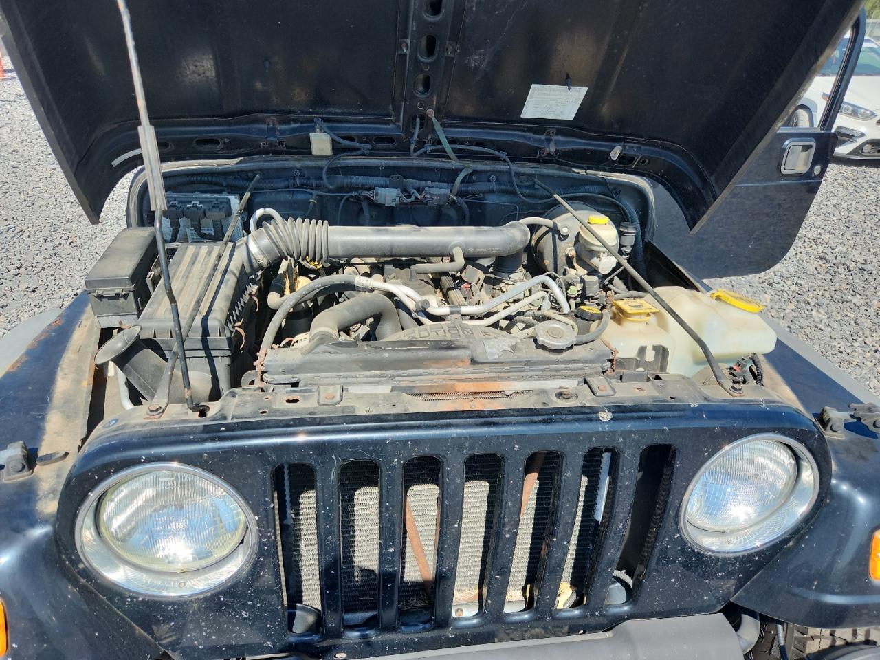 2004 Jeep Wrangler / Tj Sport Black vin: 1J4FA49S14P757130
