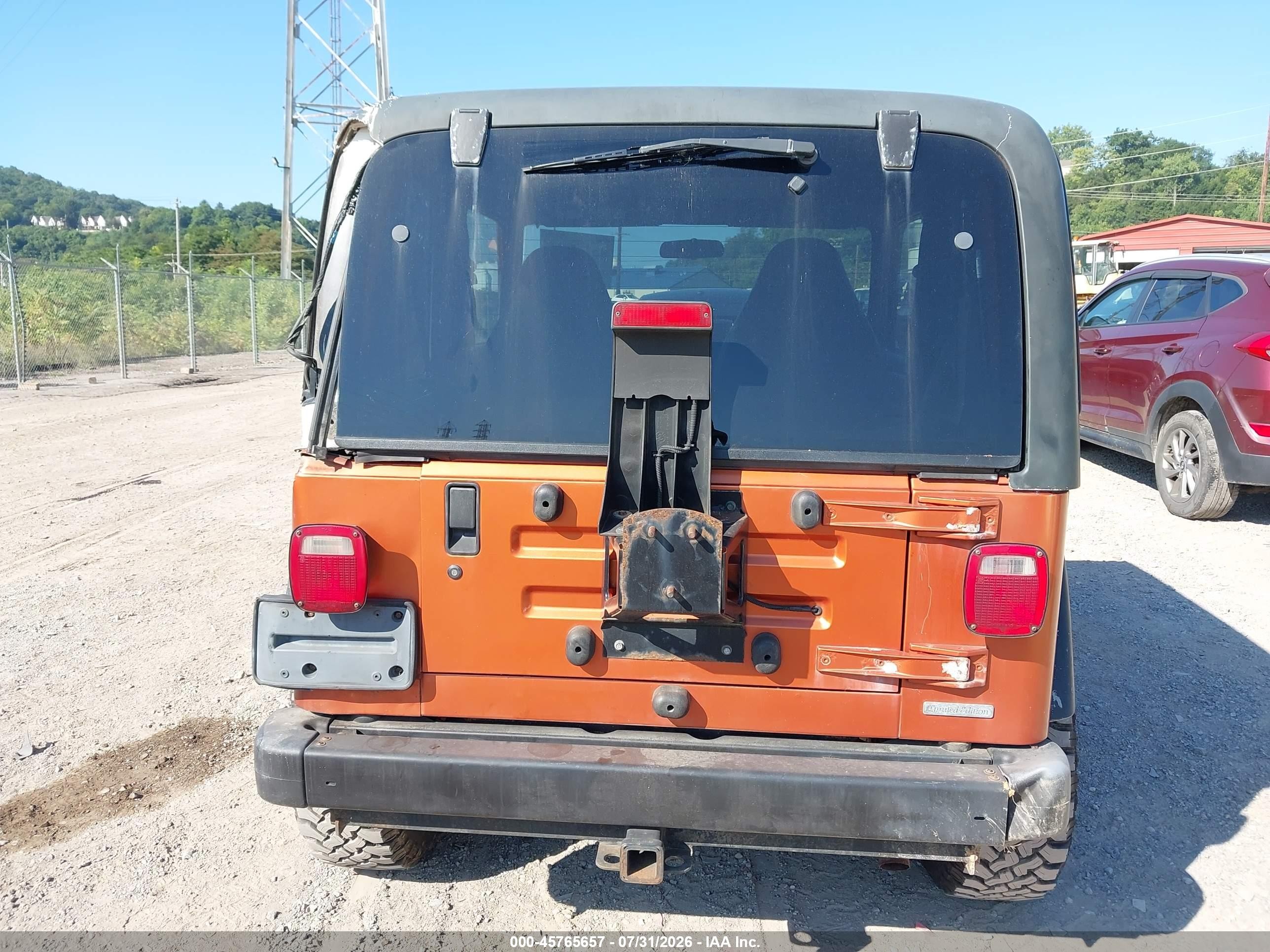 2001 Jeep Wrangler Sport Orange vin: 1J4FA49S21P368010