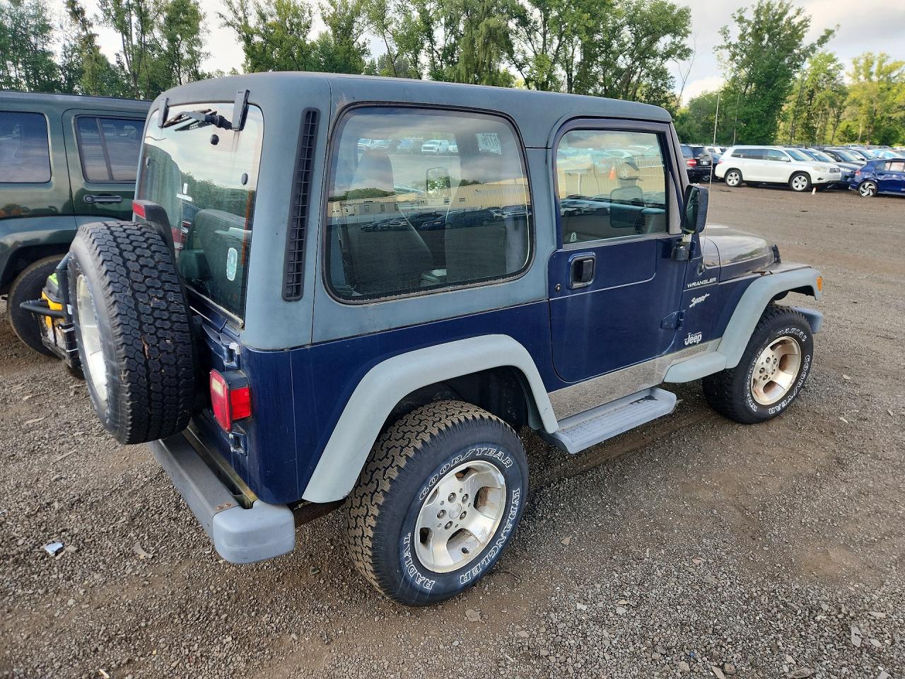 2002 Jeep Wrangler / Tj Sport Blue vin: 1J4FA49S22P761443