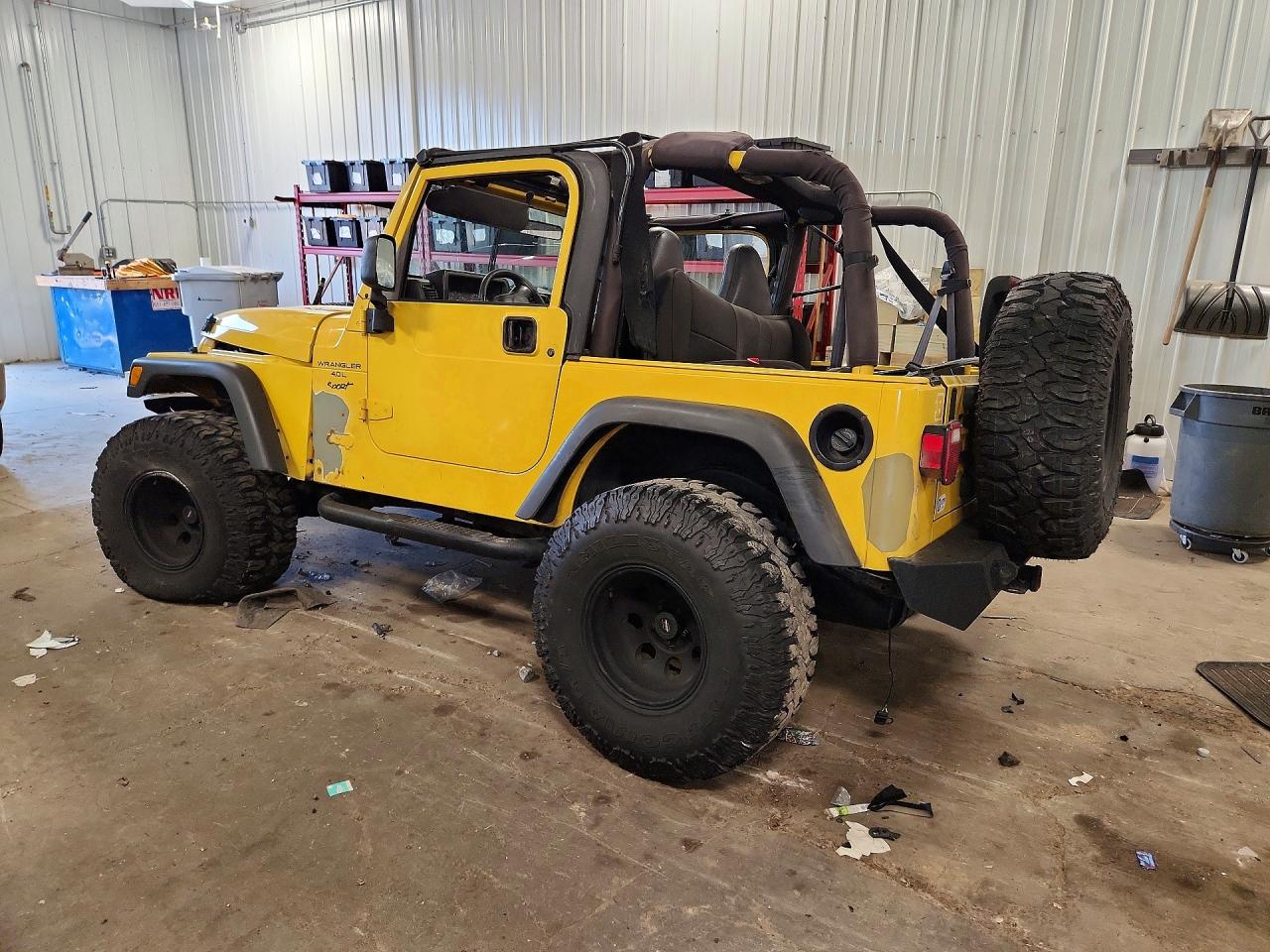 2000 Jeep Wrangler / Tj Sport Yellow vin: 1J4FA49S2YP786299