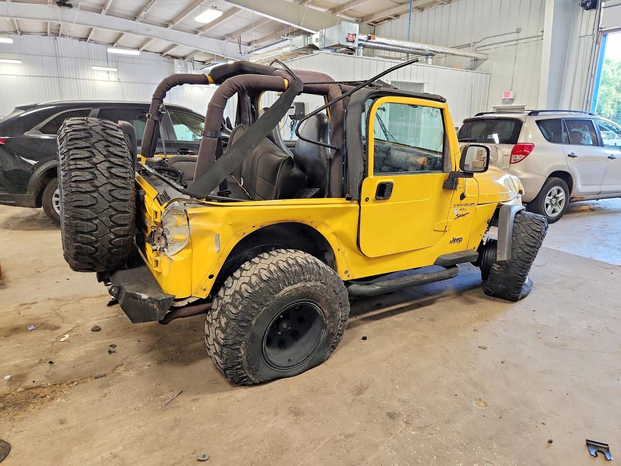 2000 Jeep Wrangler / Tj Sport Yellow vin: 1J4FA49S2YP786299