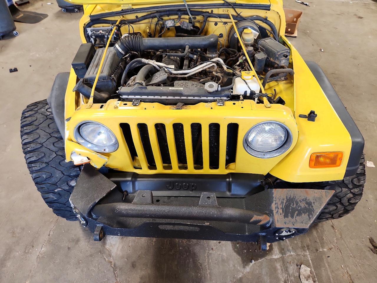 2000 Jeep Wrangler / Tj Sport Yellow vin: 1J4FA49S2YP786299