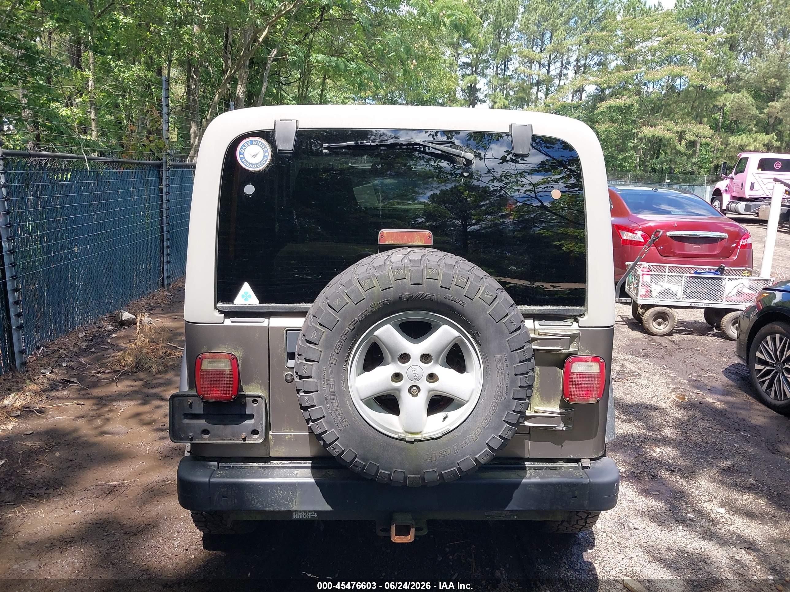 2003 Jeep Wrangler Sport Золотой vin: 1J4FA49S33P332653