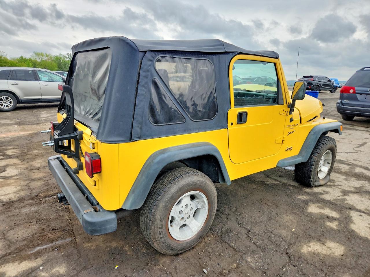 2000 Jeep Wrangler / Tj Sport Yellow vin: 1J4FA49S3YP749004