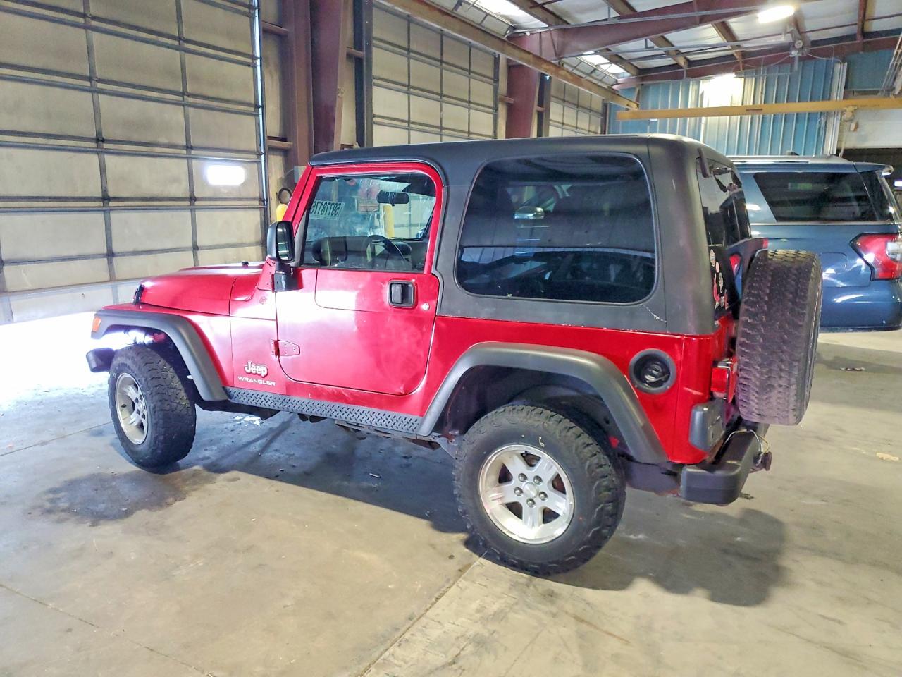 2004 Jeep Wrangler / Tj Sport Red vin: 1J4FA49S44P743691