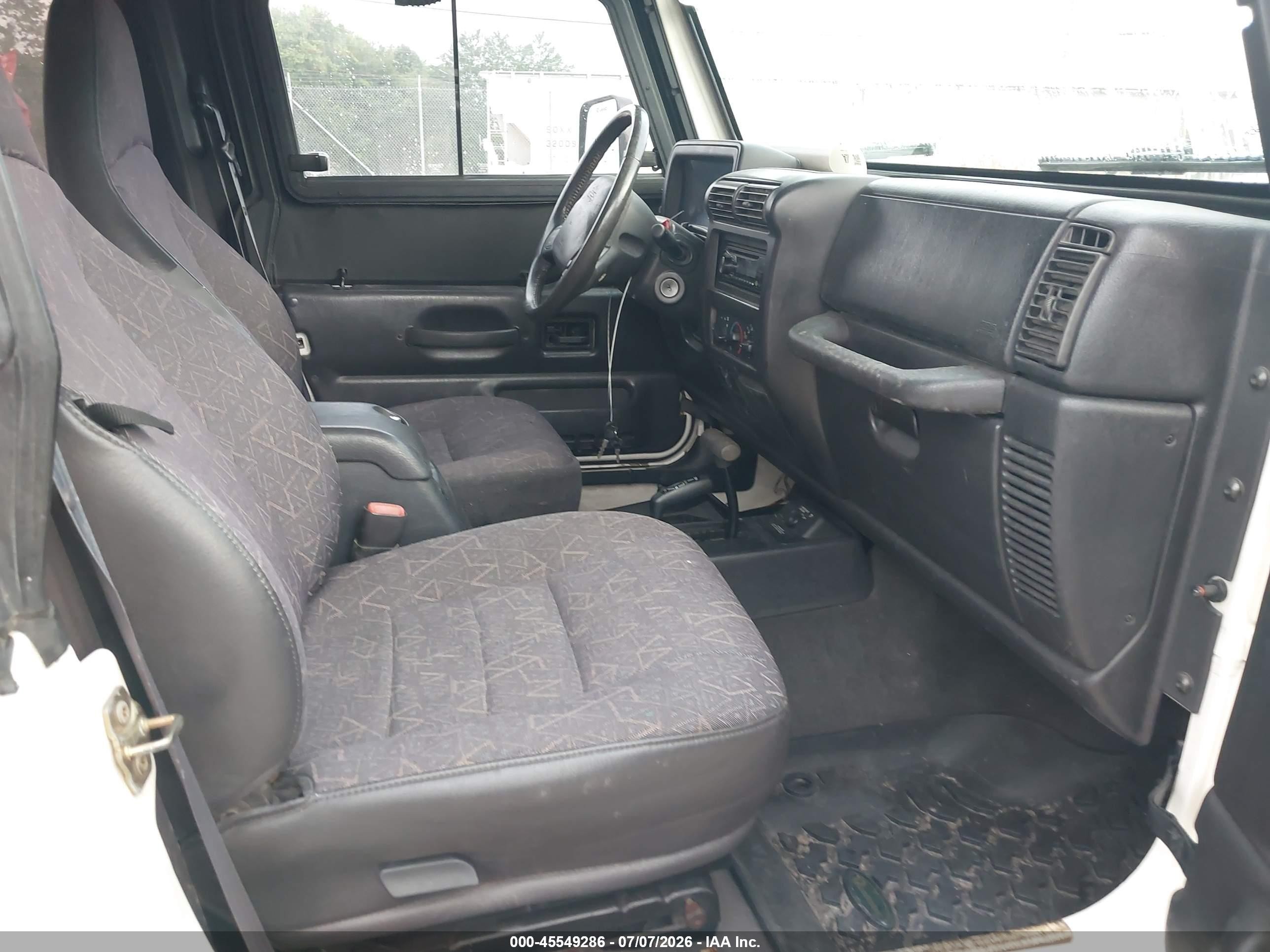 2002 Jeep Wrangler Sport Белый vin: 1J4FA49S52P702807