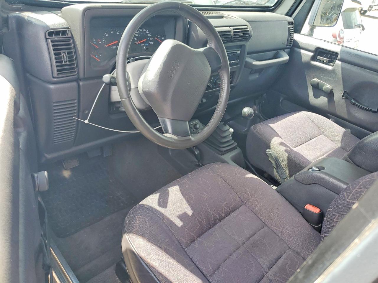 2002 Jeep Wrangler / Tj Sport Silver vin: 1J4FA49S52P723947
