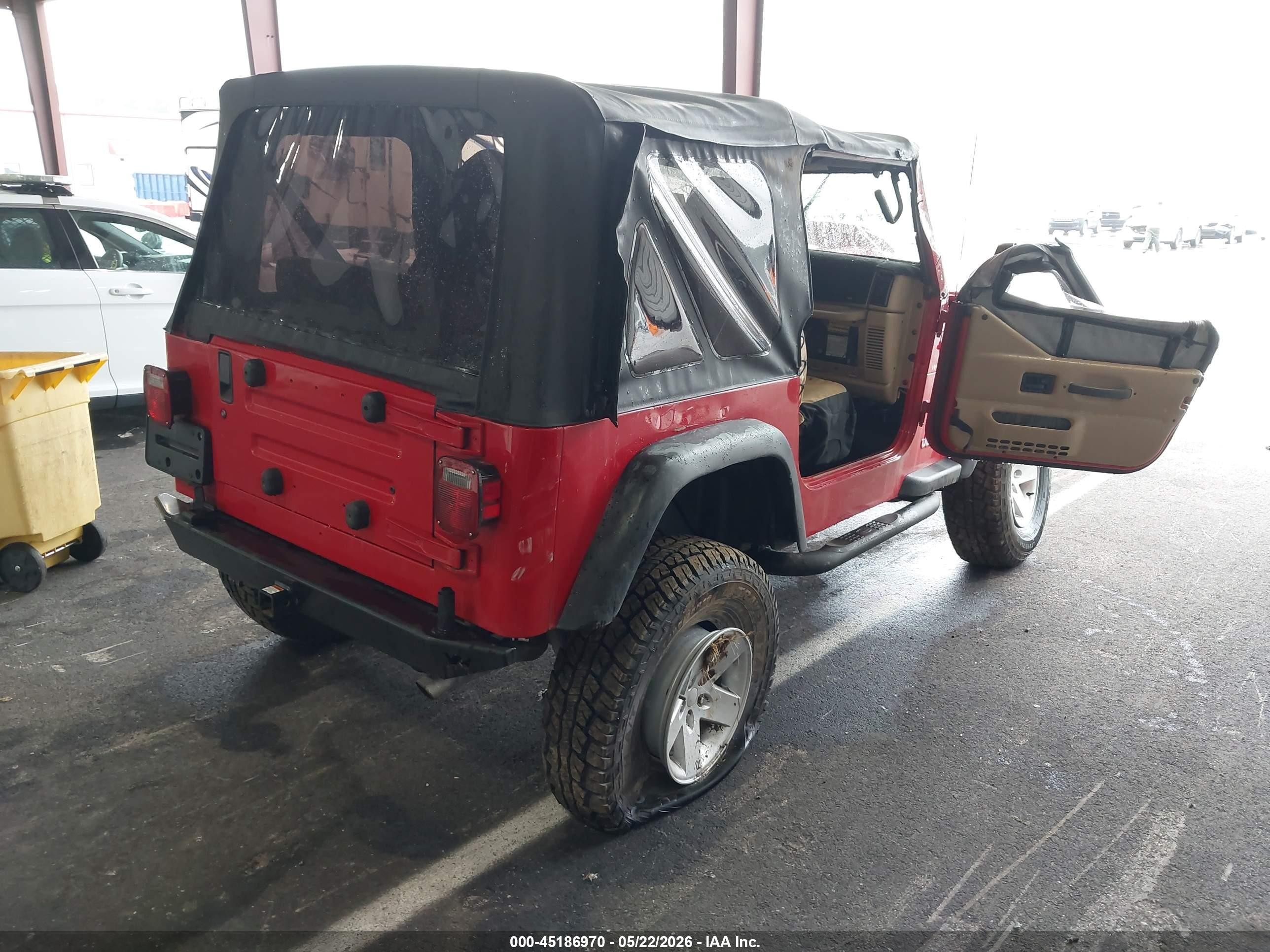 2000 Jeep Wrangler Sport Red vin: 1J4FA49S5YP775393