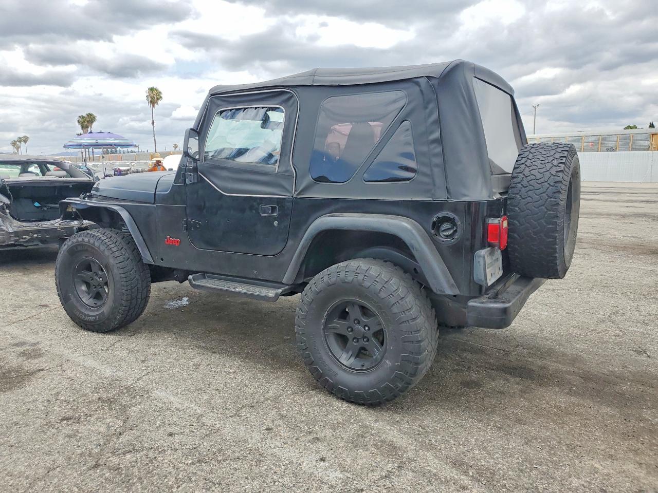 2002 Jeep Wrangler / Tj Sport Black vin: 1J4FA49S62P719289