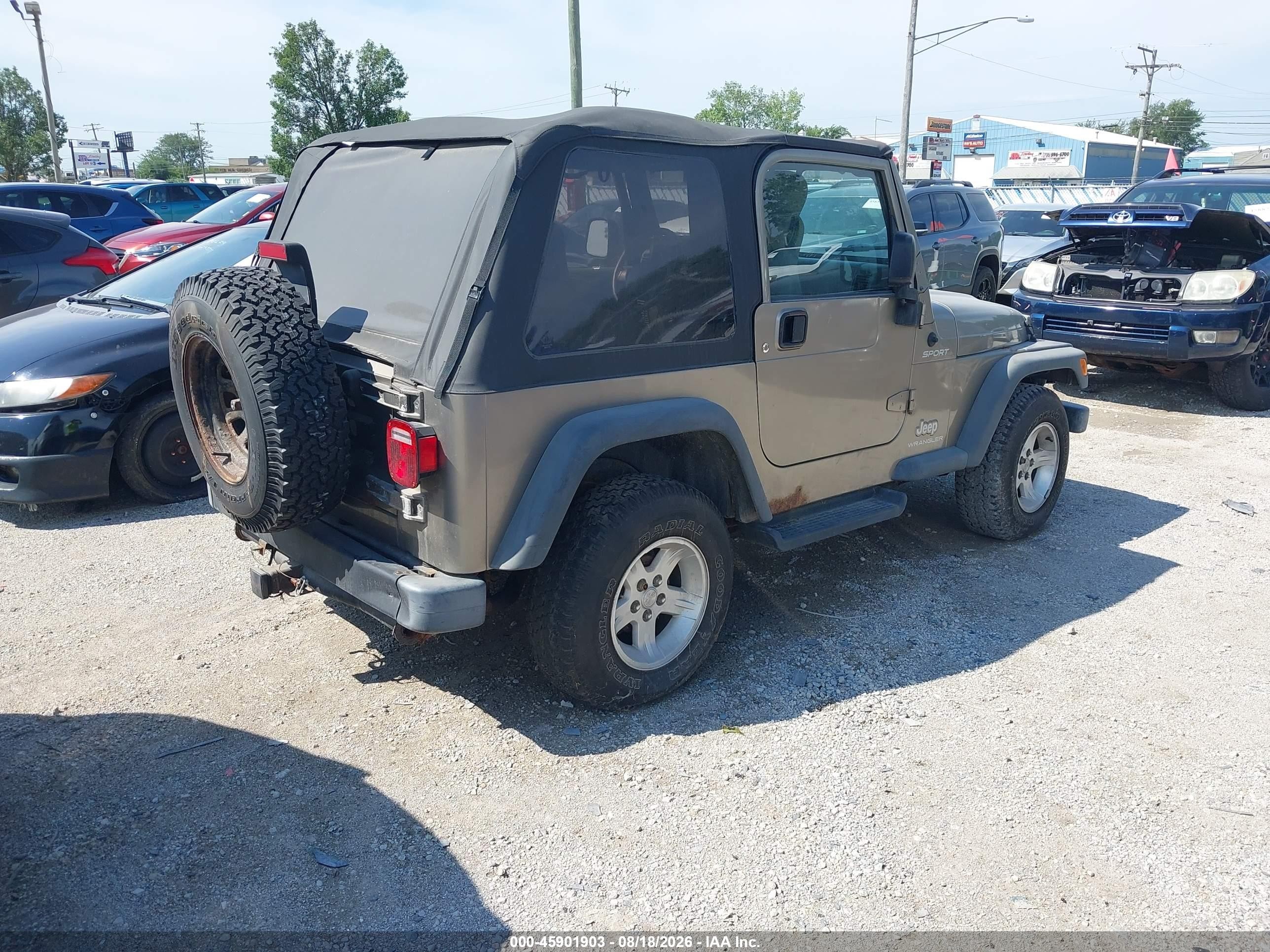 2004 Jeep Wrangler Sport Tan vin: 1J4FA49S64P724088