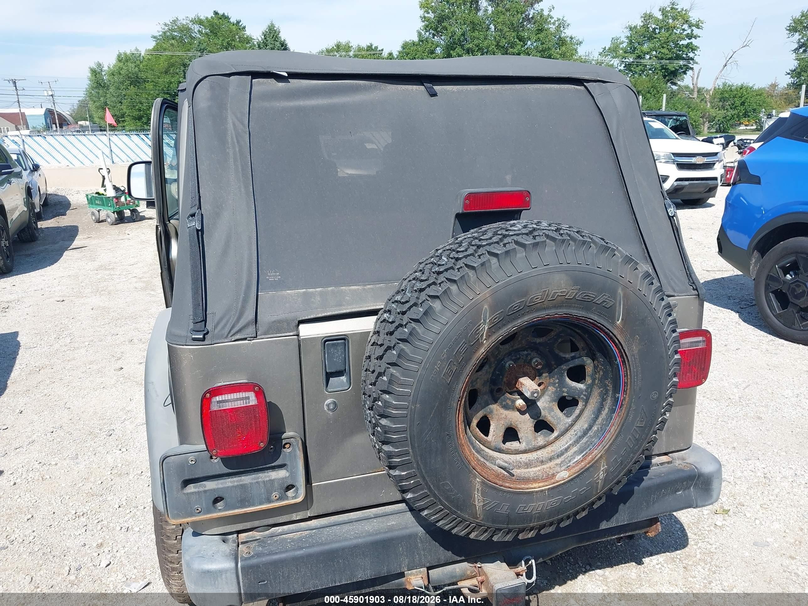 2004 Jeep Wrangler Sport Tan vin: 1J4FA49S64P724088