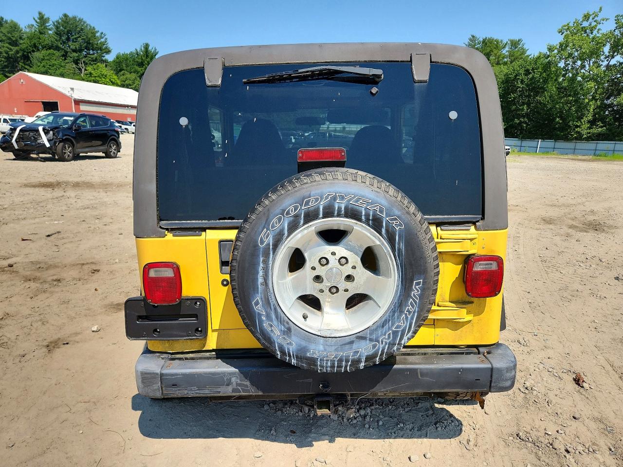 2002 Jeep Wrangler / Tj Sport Yellow vin: 1J4FA49S72P713002