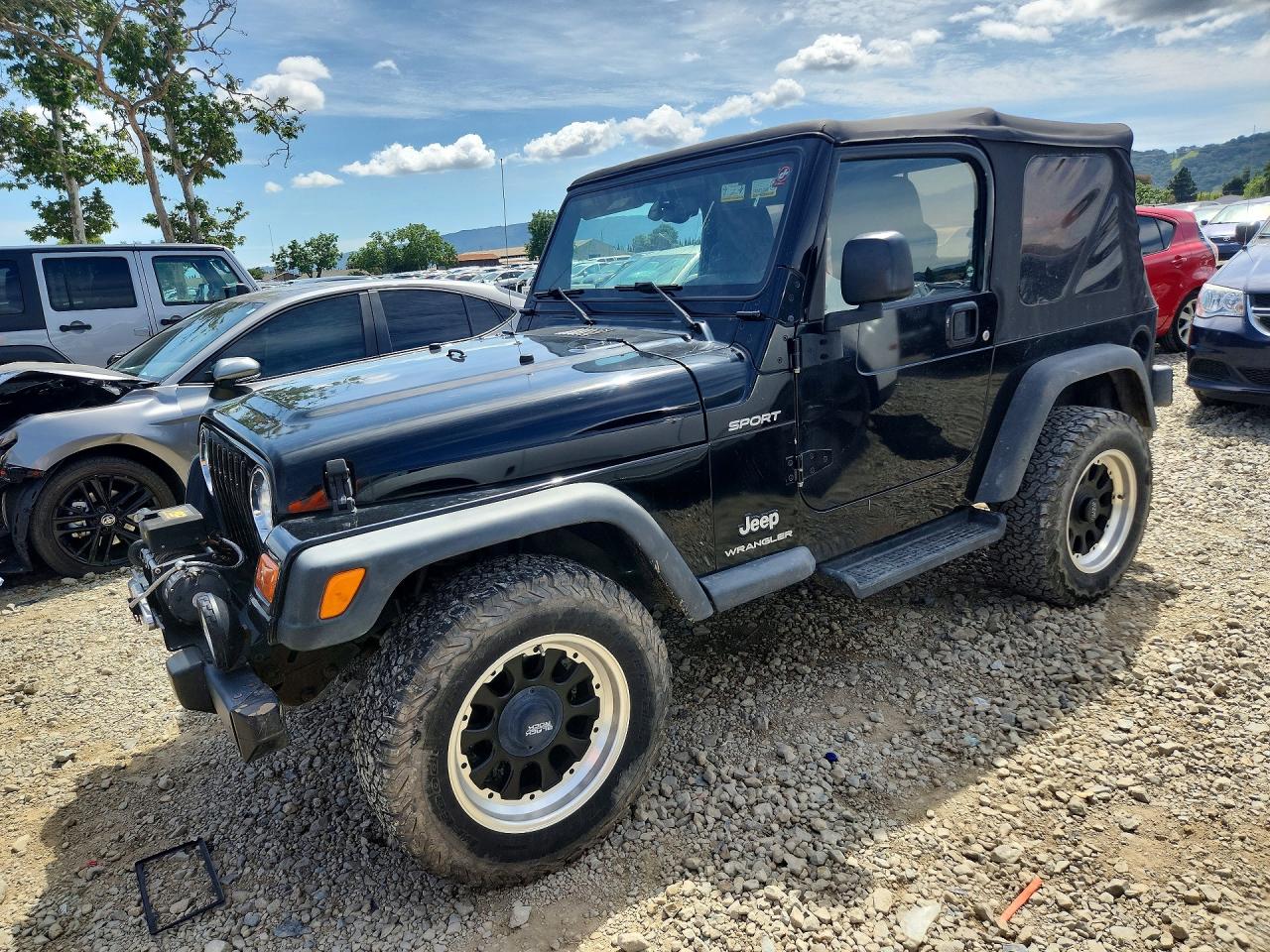 2003 Jeep Wrangler / Tj Sport Black vin: 1J4FA49S93P330812