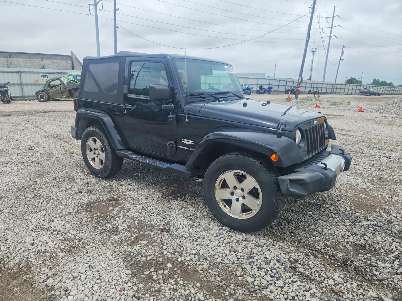 2009 Jeep Wrangler Sahara Black vin: 1J4FA54139L775910