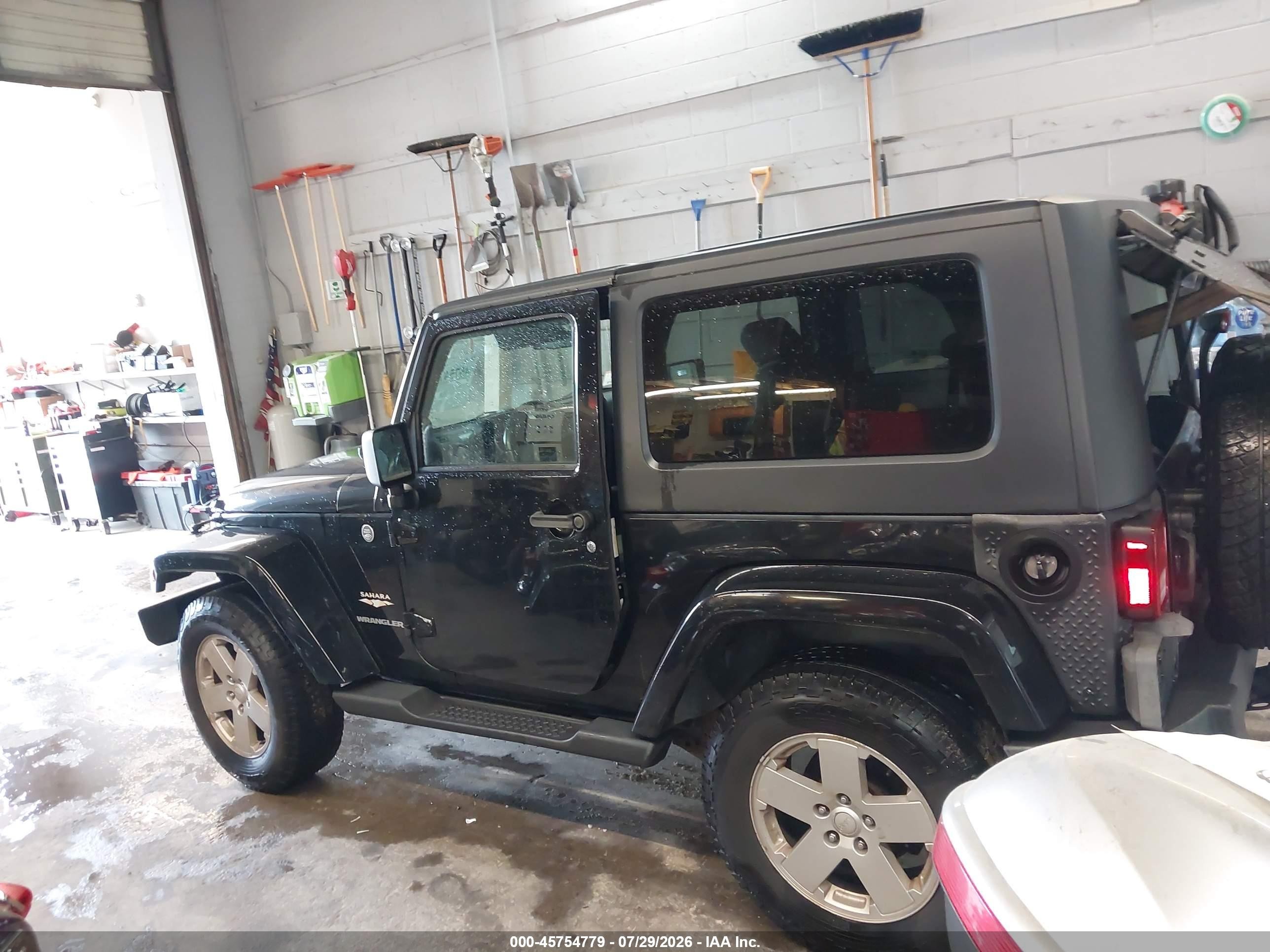 2007 Jeep Wrangler Sahara Black vin: 1J4FA54167L164623