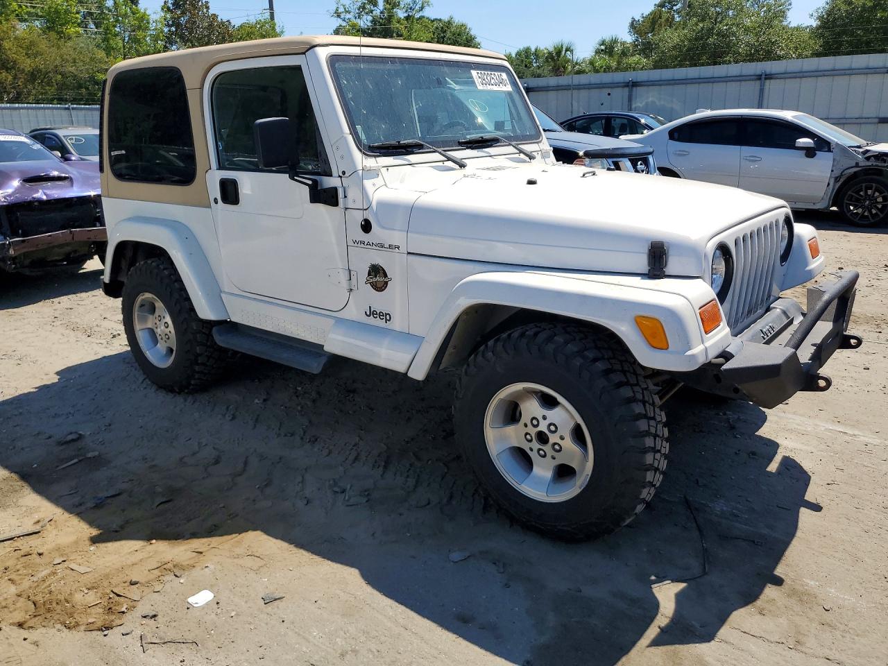 2002 Jeep Wrangler / Tj Sahara White vin: 1J4FA59S12P731775