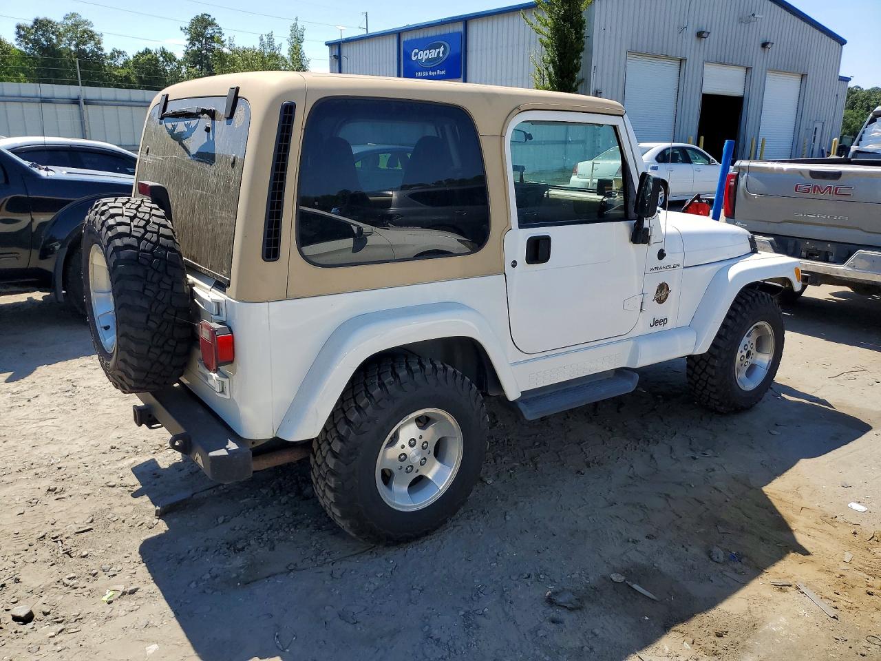 2002 Jeep Wrangler / Tj Sahara White vin: 1J4FA59S12P731775