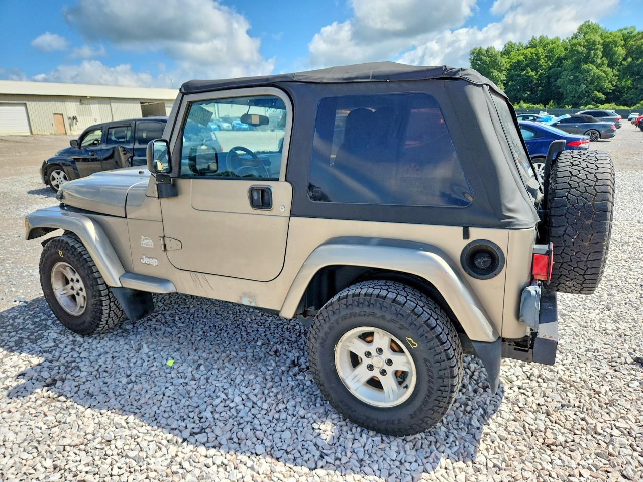 2004 Jeep Wrangler / Tj Sahara Tan vin: 1J4FA59S14P712680