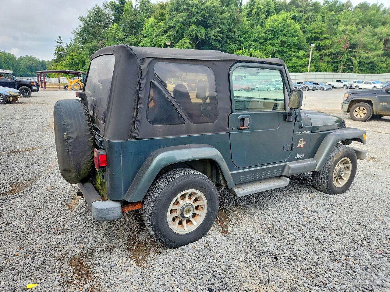 2002 Jeep Wrangler / Tj Sahara Green vin: 1J4FA59S22P725130